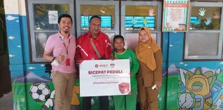 SiCepat Ekspres Berikan Bantuan Alat Dengar untuk Keluarga Karyawan